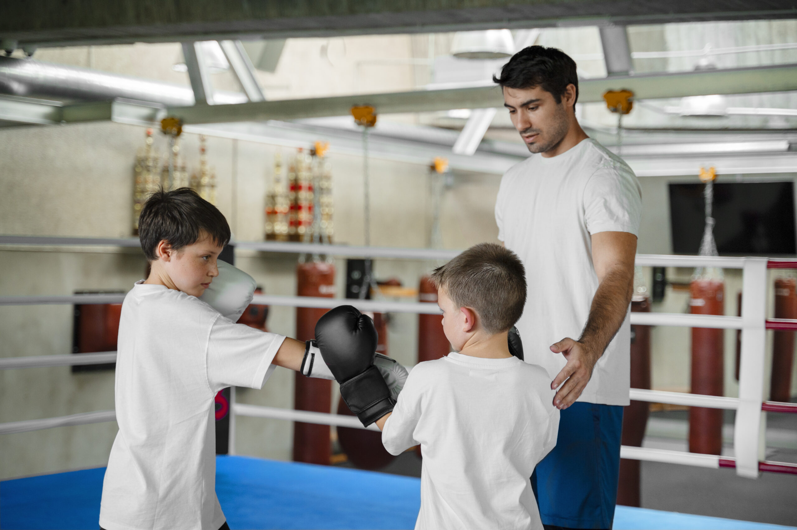 side-view-kids-learning-boxing